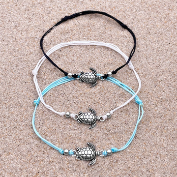 Zeeschildpad surfer enkelband set