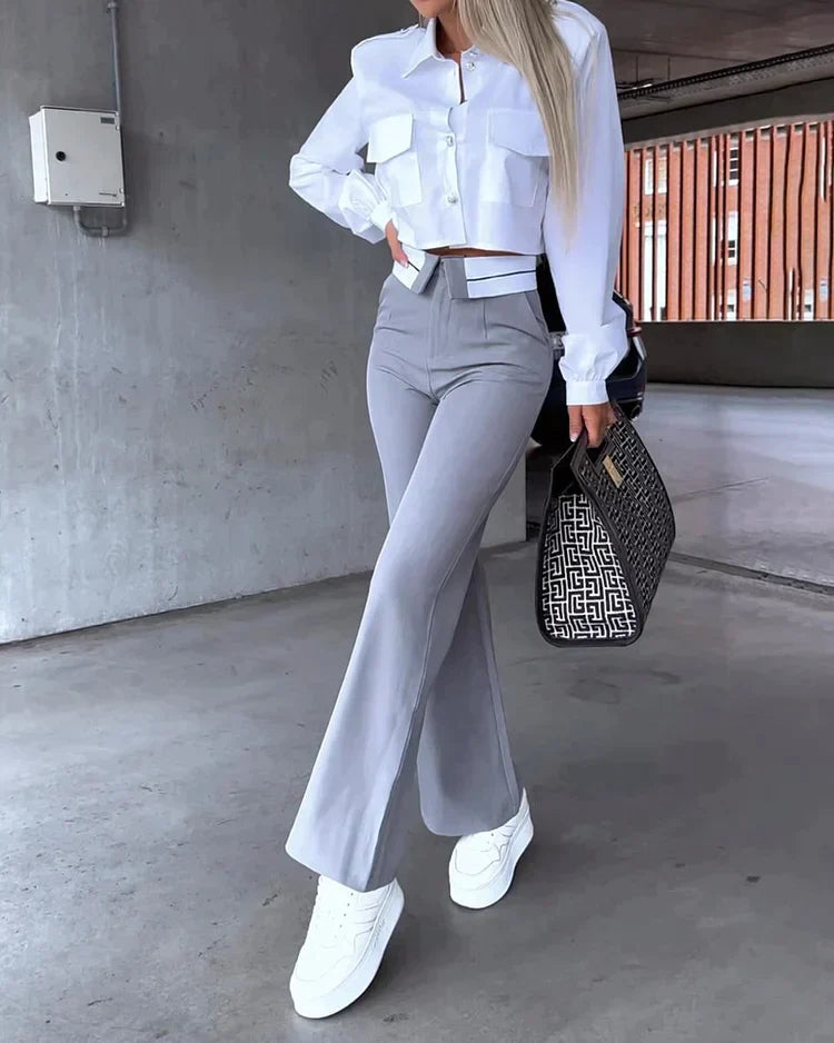 Tweedelig pak met broek en reverstop met lange mouwen