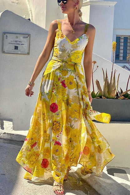 Maria – gele maxi-jurk met spaghettibandjes en bloemenprint